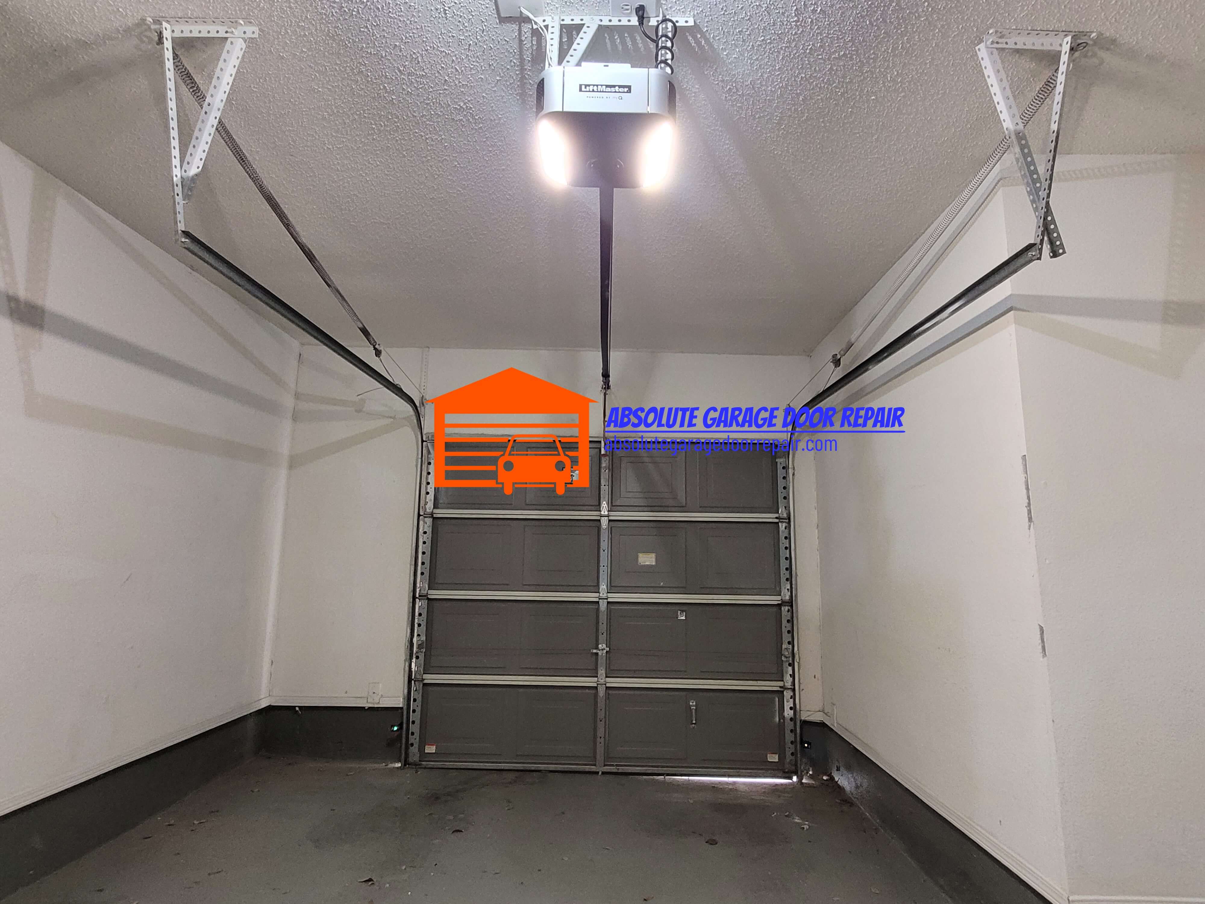 absolutegaragedoorrepair.com_garage_door_extension_springs_repair