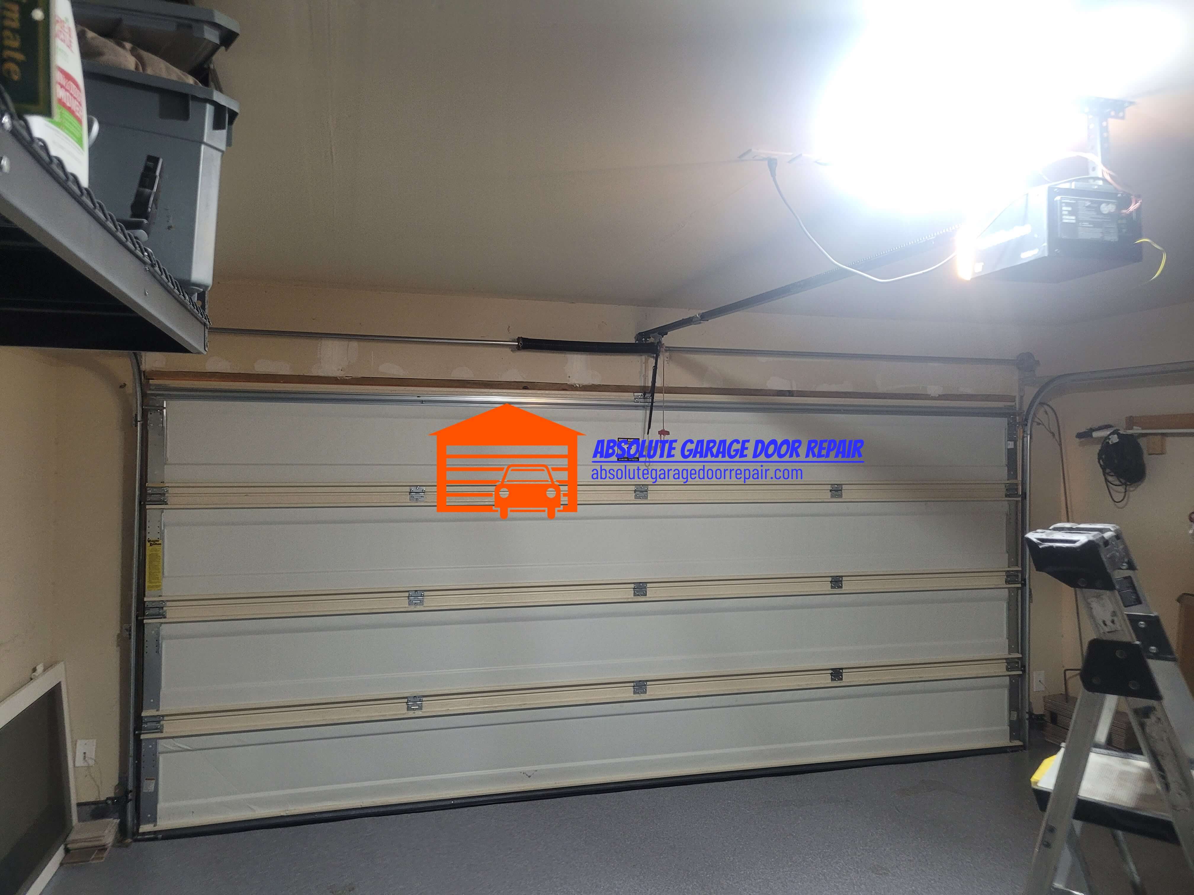 absolutegaragedoorrepair.com_wayne_dalton_garage_door_spring_conversion